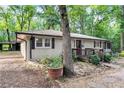 Charming single-story home with a well-maintained front entrance and walkway at 103 Campground School Rd, Dallas, GA 30157