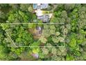 A peaceful aerial view of the property's wooded lot at 1909 Moores Mill Nw Rd, Atlanta, GA 30318