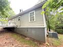 The house's back exterior shows the house and backyard at 2037 Lakewood Trl Se, Atlanta, GA 30315
