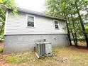 The back exterior shows the house with AC and yard at 2037 Lakewood Trl Se, Atlanta, GA 30315
