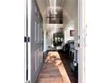 Inviting foyer with gleaming wood floors, soaring ceilings, and an elegant staircase leading to the upper level at 3241 Alhambra Cir, Hampton, GA 30228