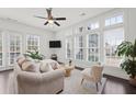 Bright living room boasts natural light, neutral decor, and a cozy seating arrangement at 6711 Cadence Blvd, Atlanta, GA 30328