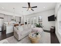 Stylish living area with integrated kitchen, perfect for entertaining and modern living at 6711 Cadence Blvd, Atlanta, GA 30328