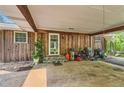 Covered carport entrance with ample storage space and outdoor access, combining convenience with functional design at 263 Lynn Dr, Fayetteville, GA 30215