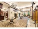 Grand lobby featuring elegant chandeliers, tables, and comfortable seating at 3334 Peachtree Ne Rd # 608, Atlanta, GA 30326