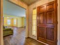 Welcoming foyer with hardwood floors and doorway views of the living room at 1850 Francis Sw Rd, Conyers, GA 30094