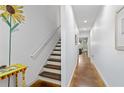 Hallway with white walls and a brown floor lead into an office space at 1346 Peter Haughton Nw Way, Atlanta, GA 30318