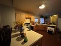 Functional kitchen with ample countertop space, wooden cabinets, and modern appliances at 3393 Chancellors Dr, Powder Springs, GA 30127