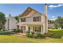 Attractive home with siding, shutters, and a manicured lawn at 982 Hunt Rd, Jonesboro, GA 30236