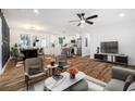 Open floor plan showcasing a combined living, dining, and kitchen area, great for modern living and entertaining at 904 Fairburn Nw Pl, Atlanta, GA 30331