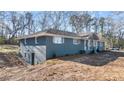Lovely single-story home showcasing classic design and a well-kept lawn at 9588 Poston Rd, Jonesboro, GA 30238