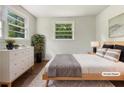 Cozy bedroom with a comfortable bed, dresser, and bright natural light at 4239 Canby Ln, Decatur, GA 30035