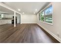 Spacious living room showcasing dark wood floors and abundant natural light at 4239 Canby Ln, Decatur, GA 30035