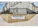 Broadview Place community sign on brick base with black metal fence detail at 635 Broadview Ne Pl, Atlanta, GA 30324