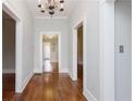 Hallway with wooden floors and neutral wall paint at 744 Oakland Se Ave, Atlanta, GA 30315