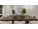 Contemporary dining room featuring an expansive wooden table with seating for eight at 1860 Mountain Shadow, Stone Mountain, GA 30087