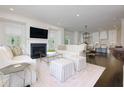 Bright living room features a fireplace, plush seating, and an open layout at 3481 Landen Pine Ne Ct, Atlanta, GA 30305
