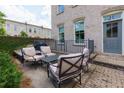 Cozy outdoor patio featuring comfortable seating, a grill, and lush green surroundings at 3481 Landen Pine Ne Ct, Atlanta, GA 30305