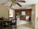 Functional kitchen with classic cabinetry and a cozy dining area at 2413 Charleston Oaks Ln, Decatur, GA 30030