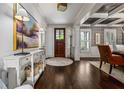 Elegant foyer with dark wood floors, white trim, and stylish decor at 3013 Walker Hill Way, Marietta, GA 30064