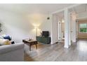 Bright and open living area with wood-look floors and neutral paint at 286 Booker Sw St, Atlanta, GA 30315