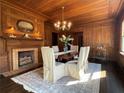 Formal dining room with wood accents, fireplace, and space for entertaining at 6104 Floyd St, Covington, GA 30014