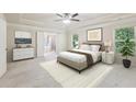 Serene main bedroom with tray ceiling, neutral tones, ensuite bathroom, and ample natural light at 337 Liberty Dr, Acworth, GA 30102