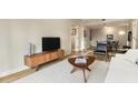 Inviting living room featuring modern furniture, wood floors, and an open layout at 195 14Th St # 1501, Atlanta, GA 30308