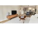 Open concept living area with a view of the dining space at 195 14Th St # 1501, Atlanta, GA 30309