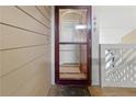 Charming front door with glass panel, opening to a bright hallway at 690 Mcgill Ne Pl, Atlanta, GA 30312