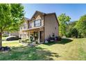 Attractive two-story home with a well-manicured lawn and charming front porch at 345 Piedmont Cir, Covington, GA 30016