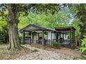 Quaint home featuring a covered porch and a lovely outdoor entertaining area at 901 United Se Ave, Atlanta, GA 30316