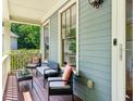 Inviting front porch with seating, ideal for relaxing and enjoying the outdoor views and neighborhood at 2078 Marshalls Se Ln, Atlanta, GA 30316
