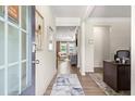 Bright entryway with hardwood floors, leading to a modern living space at 323 Silver Leaf Trce, Douglasville, GA 30134