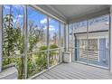 A lovely screened-in porch with outdoor views at 960 Byron Sw Dr, Atlanta, GA 30310