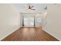 Bright living room featuring hardwood floors and natural light at 274 Paden Cove Trl, Lawrenceville, GA 30044
