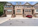 Inviting brick townhome with a garage and staircase, offering comfortable and convenient living with easy access at 2122 Pembroke Dr, Brookhaven, GA 30319