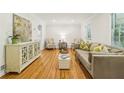 Bright living room boasts hardwood floors, stylish furniture, and elegant decor at 2381 Woodacres Ne Rd, Atlanta, GA 30345