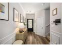 Inviting entryway with luxury vinyl flooring and modern decor, creating a warm and stylish welcome at 3406 Pennington Dr, Lithonia, GA 30038