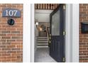 Inviting entryway with tile flooring, staircase, and a glimpse of the stylish interior design at 1634 Ponce De Leon Ave # 107, Atlanta, GA 30307
