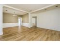 Bright and airy living room with hardwood floors and neutral wall colors at 312 Burdock Trce, Woodstock, GA 30188