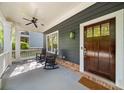 Charming covered front porch with rocking chairs and craftsman details at 2407 Boulder Se Rd, Atlanta, GA 30316