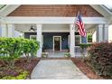 Inviting front porch with classic columns and cozy seating area at 2407 Boulder Se Rd, Atlanta, GA 30316