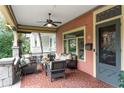 Inviting front porch with stylish seating and mosaic tile flooring at 171 Westminster Ne Dr, Atlanta, GA 30309