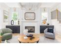 Cozy living room with fireplace, accent furniture, and natural light at 253 Rockyford Ne Rd, Atlanta, GA 30317