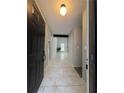 An open entry way featuring light gray walls and marble tile flooring at 3285 Rollingbrook Way, Duluth, GA 30096