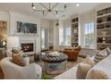 Inviting living room features a fireplace, custom shelving, and comfortable seating at 50 Canton St # 406, Alpharetta, GA 30009