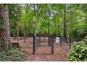 Community dog park with secure fencing and plenty of space for pets to play and socialize at 4620 Wieuca Ne Rd # 42, Atlanta, GA 30342