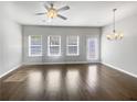 Bright, open living space featuring hardwood floors, recessed lighting, and natural light at 7119 Gladstone Cir, Lithonia, GA 30038