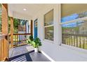 Inviting front porch featuring plants and a cozy space to relax at 1673 Richland Sw Rd, Atlanta, GA 30311